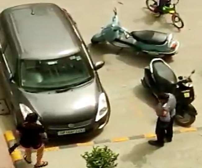 Woman hurled poles at car in parking dispute, video went viral